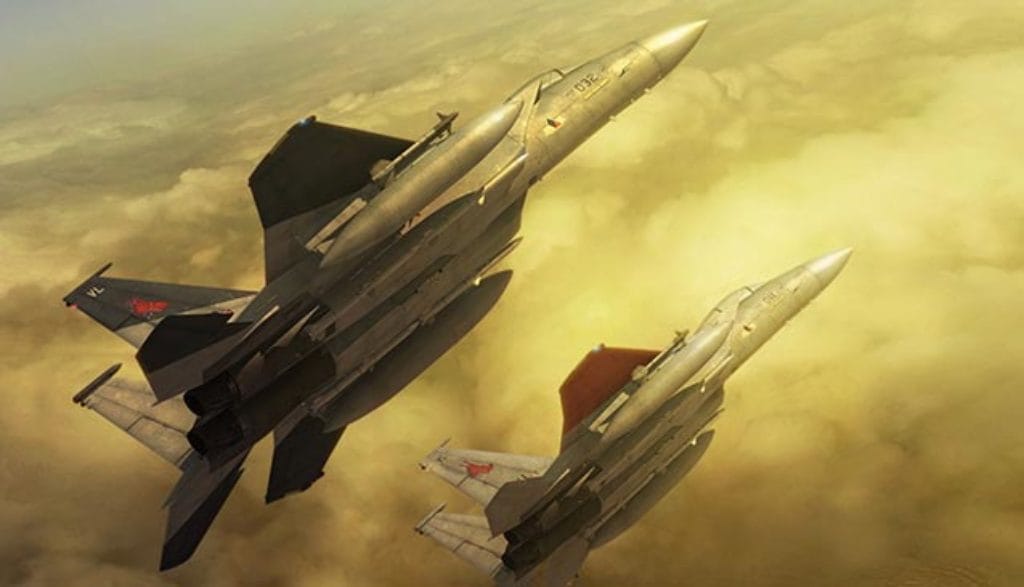 Two fighter jets above the clouds