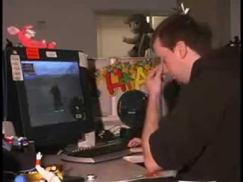 Alex Navarro "enjoying Big Rigs", in the GameSpot office.