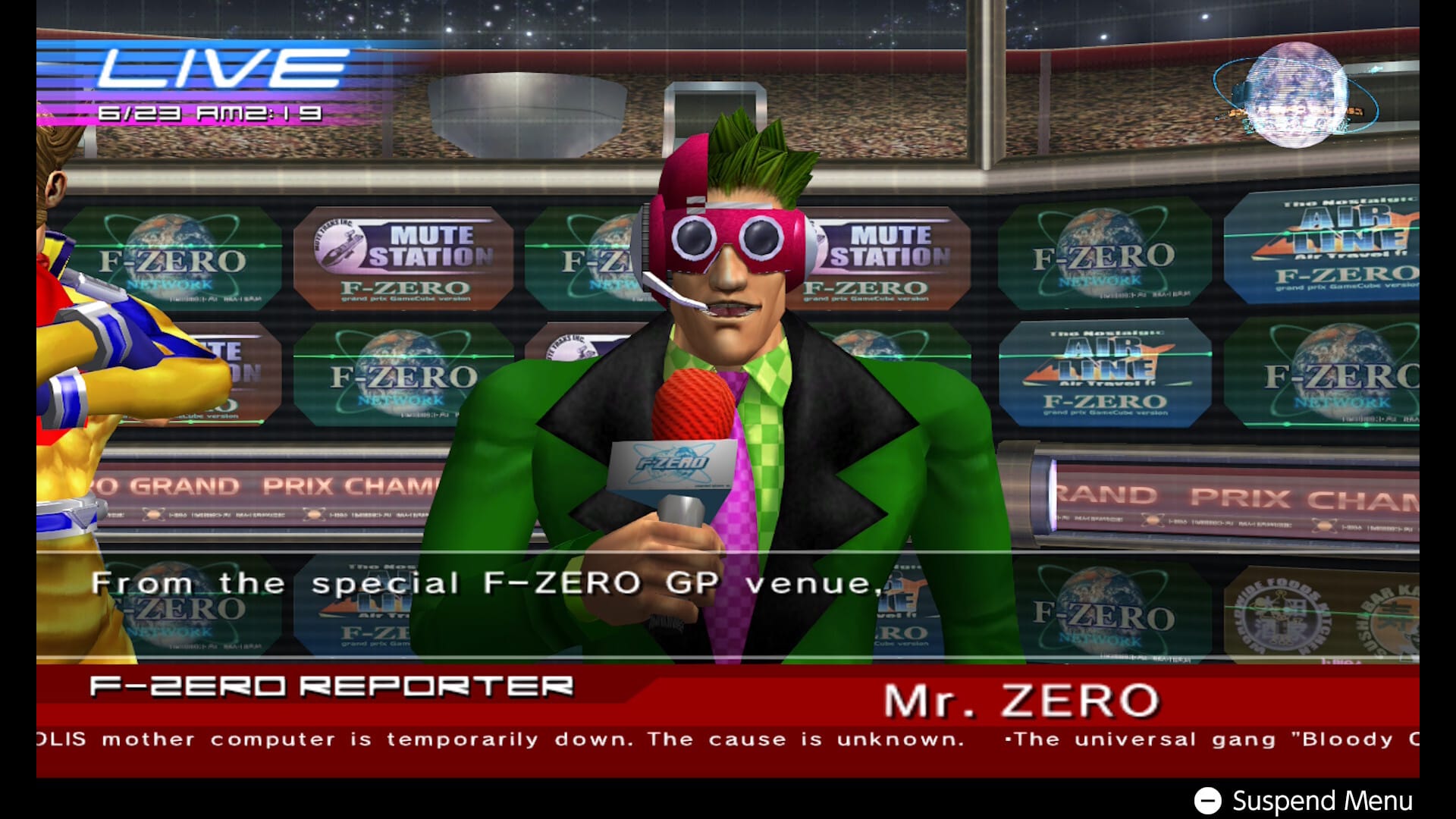F-Zero GX screenshot shows a reporter with a green suit, pink tie and strange goggles holding a microphone