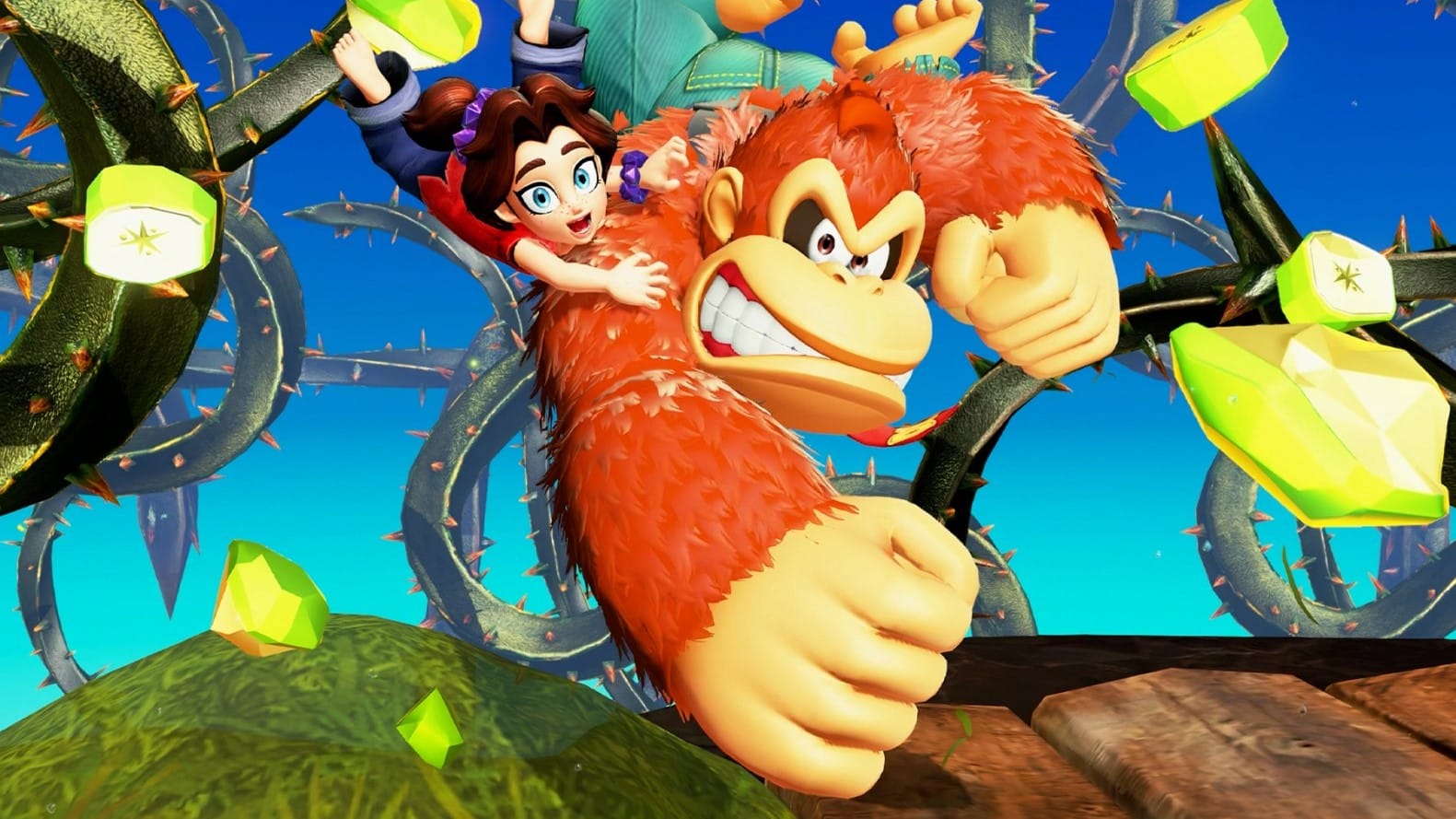 Shows Donkey Kong breaking a golden banana.
