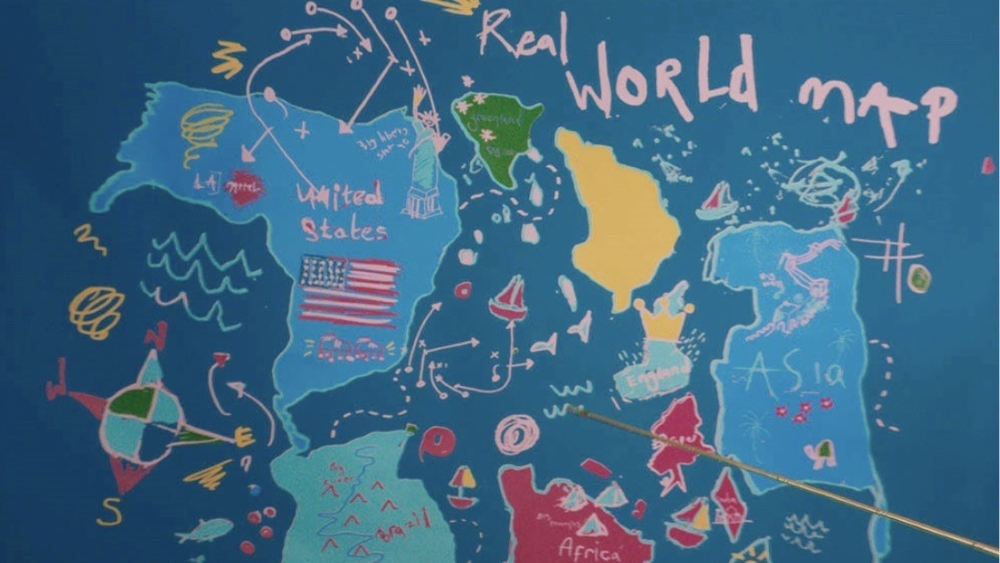 A shoddily drawn map of the world showing the US, South America, Africa, England, and Asia, which includes the nine dashed line of the South China Sea.