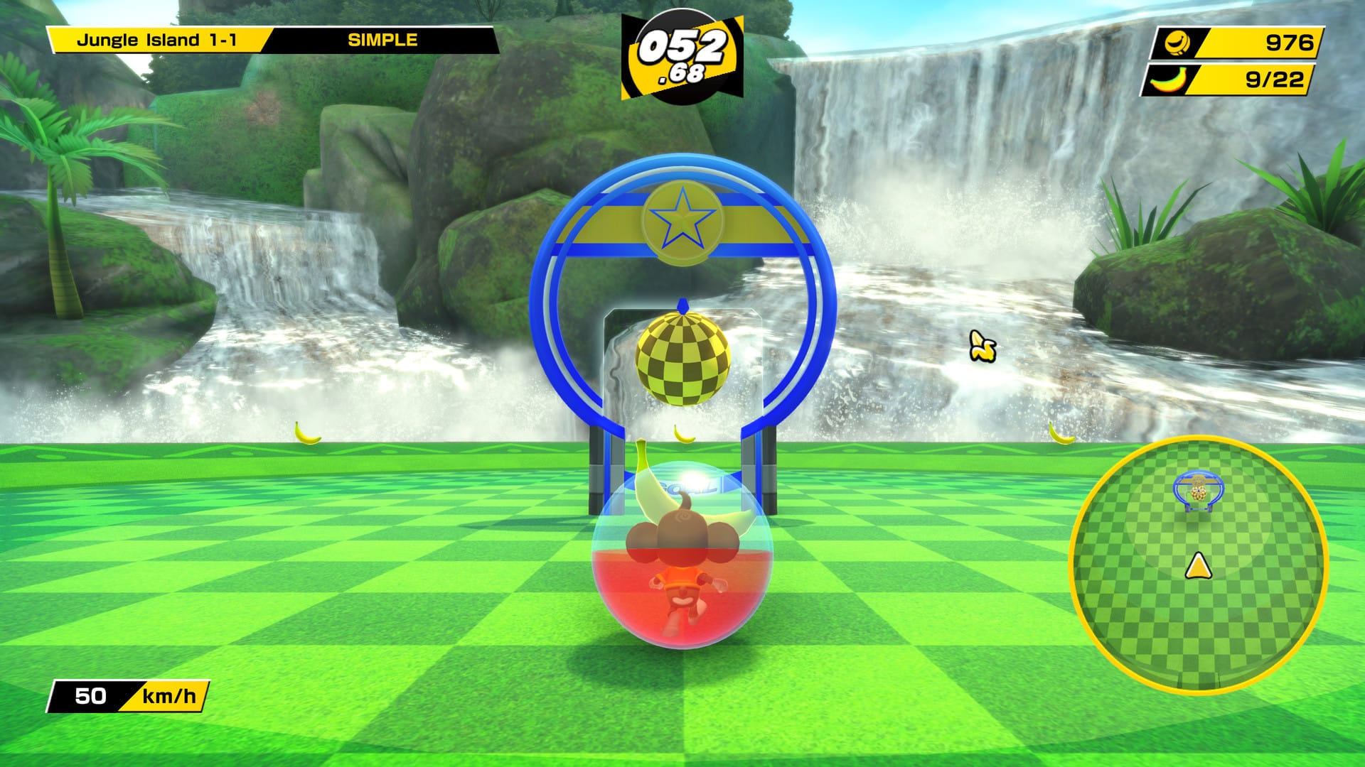 Monkey in a ball heading towards a goal on a green checkered field