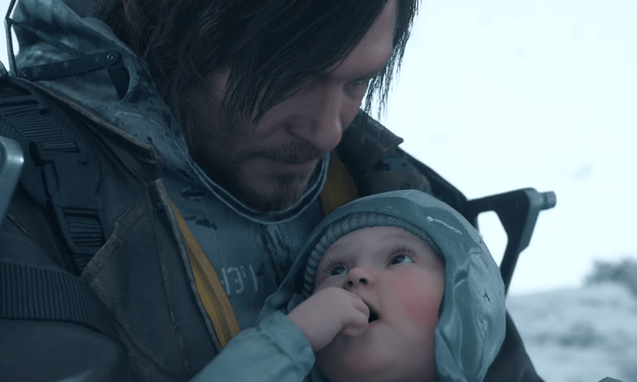 Man holding a baby